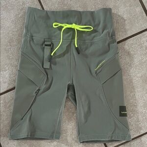 lululemon athletica Olive Green Cargo Shorts with Neon Yellow Drawstring.